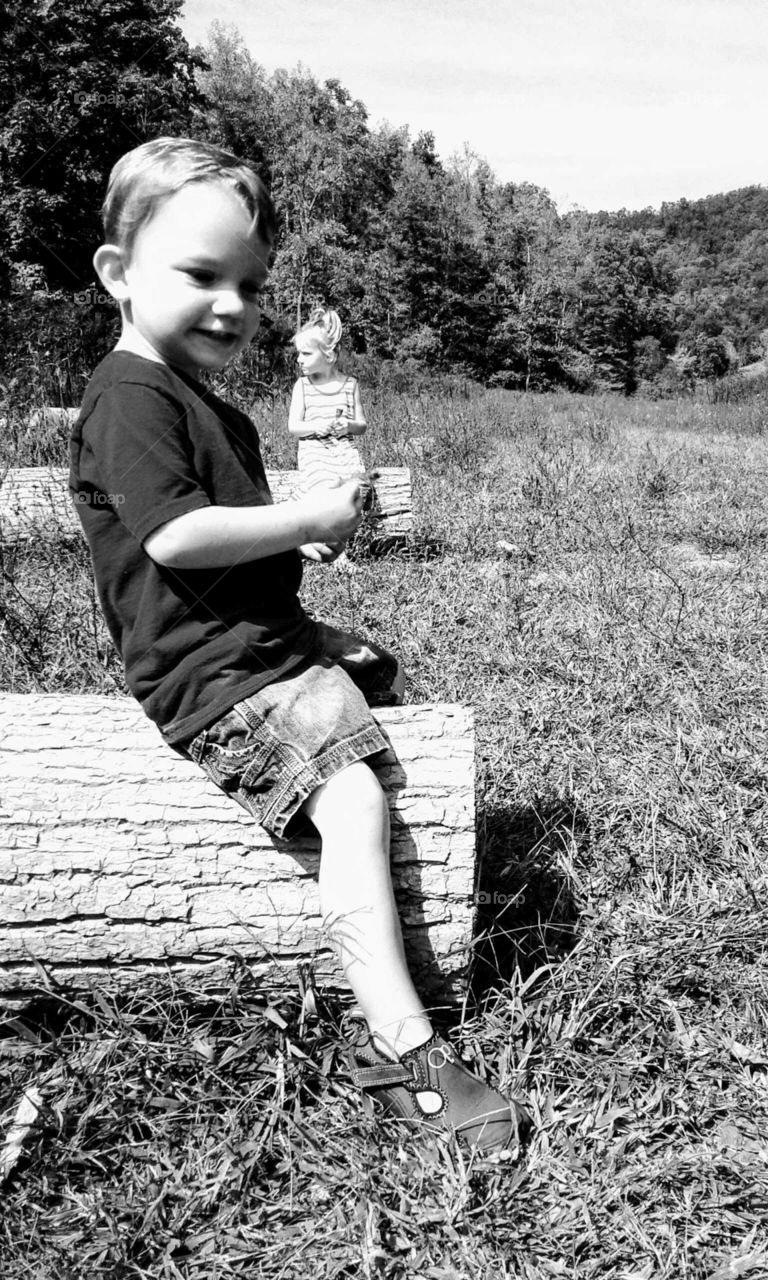 Sitting on a log