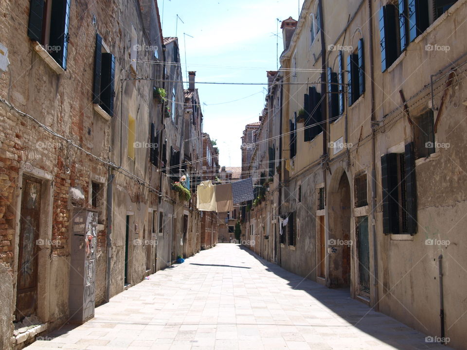 Hanging clothes in a street