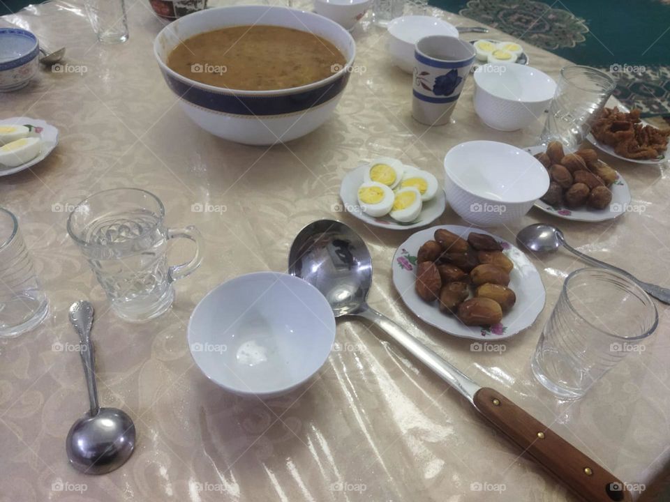 Moroccan table in Ramadan month:  Soup. Date and eggs.