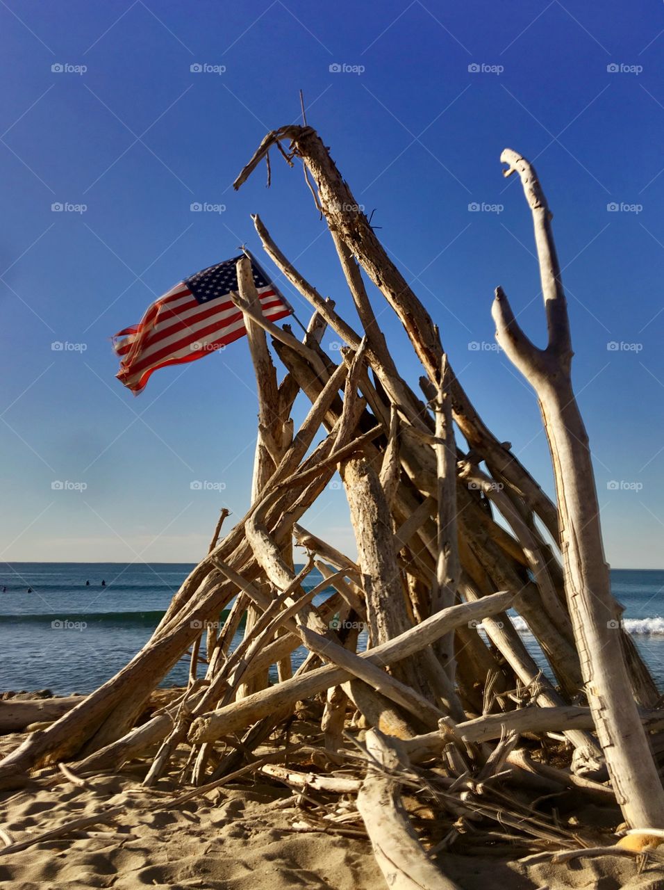 Driftwood American Flag on the Beach