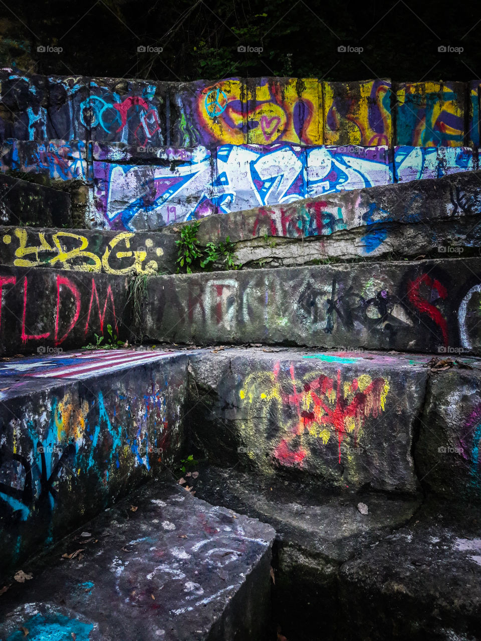 Graffiti covers stone steps, at Minnehaha park. Along Minnehaha Creek and, The Mississippi River, in Minneapolis, Minnesota.