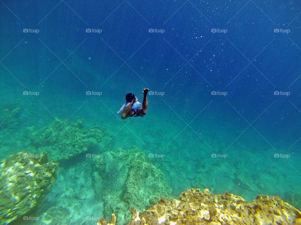 Girl swimming in the sea