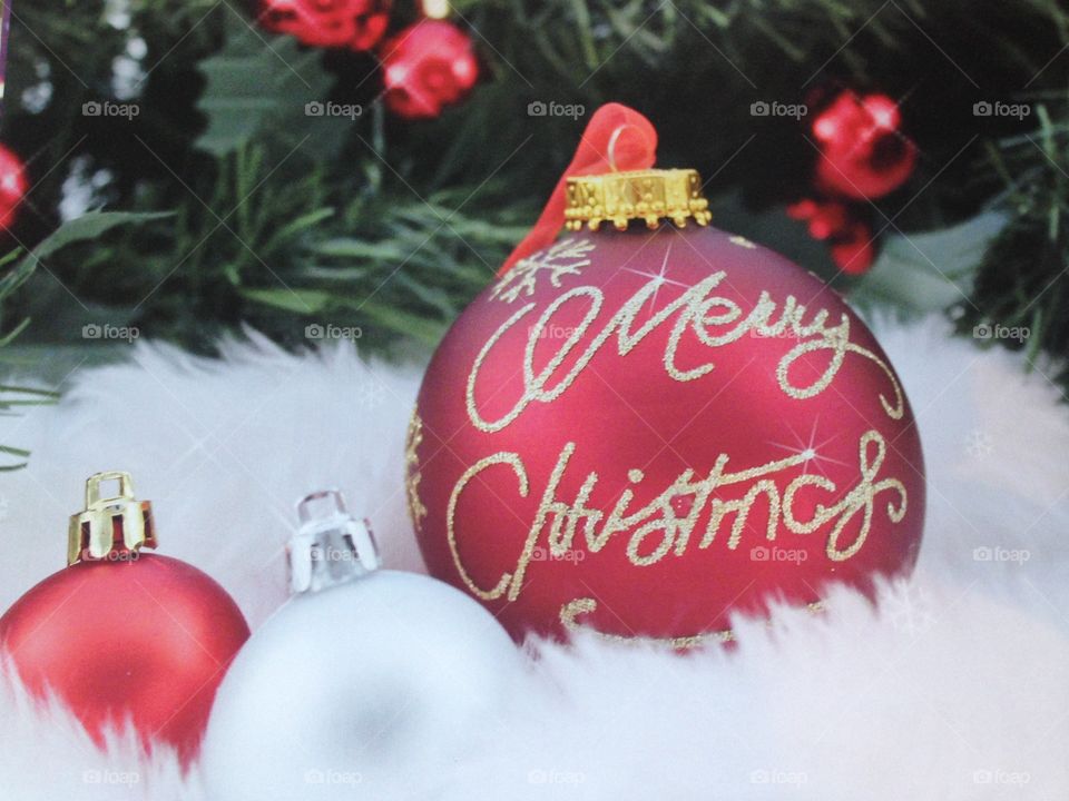 Christmas bauble on fake snow happy Christmas red ball 