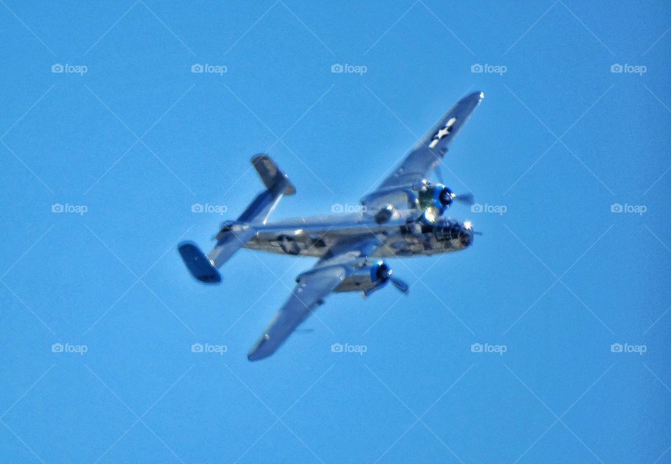 World War 2 Bomber In Flight. Vintage Restored World War II B-25 Mitchell Bomber In Flight
