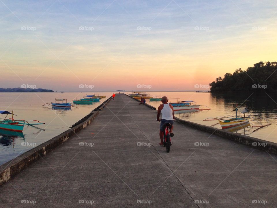 Biking towards the sunrise