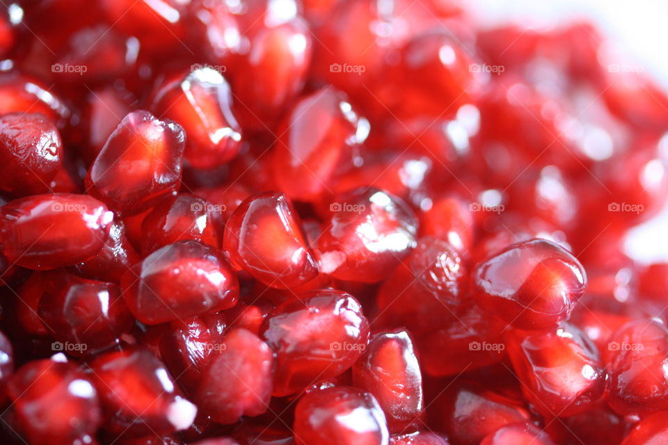 Seeds of juicy ripe pomegranate, close-up