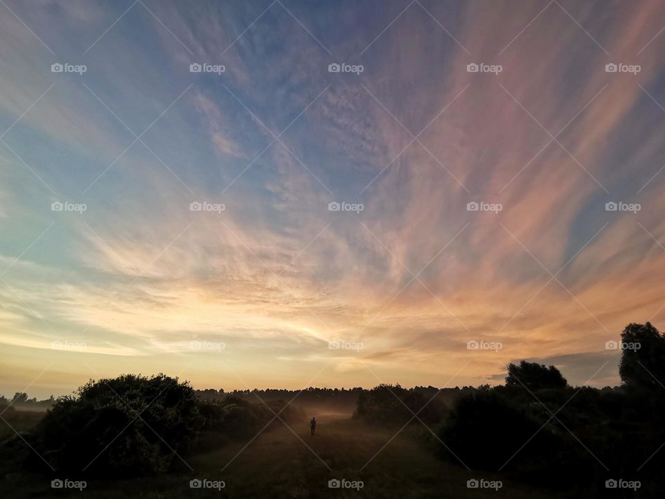 Sunset in the village fields of Belarus