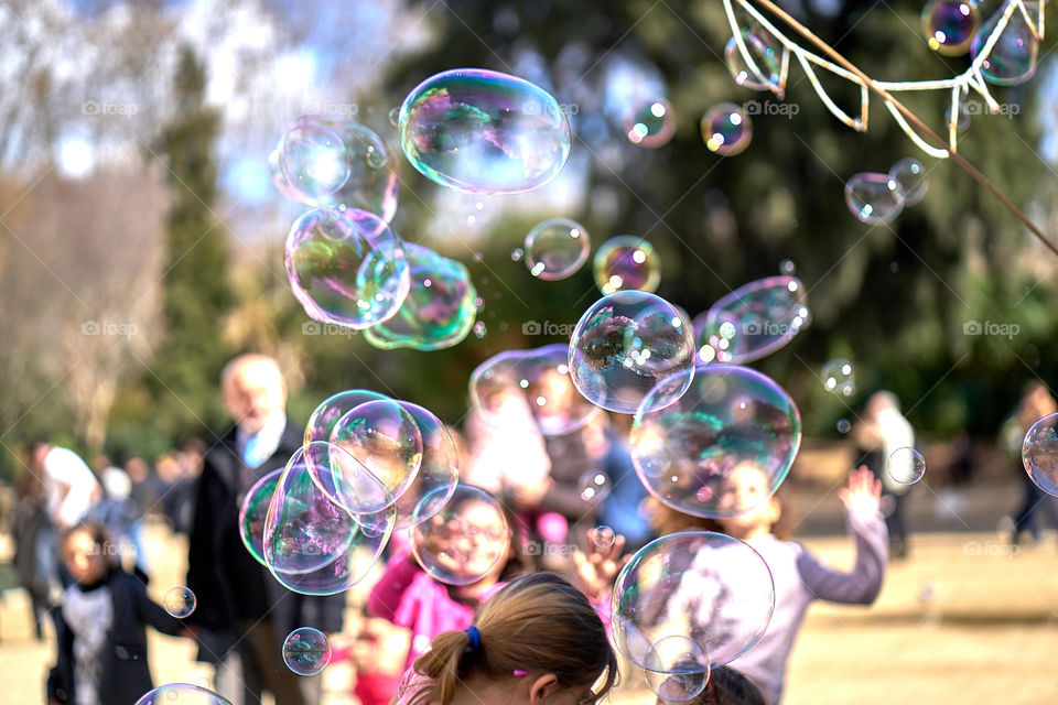 Soap bubbles flying in air