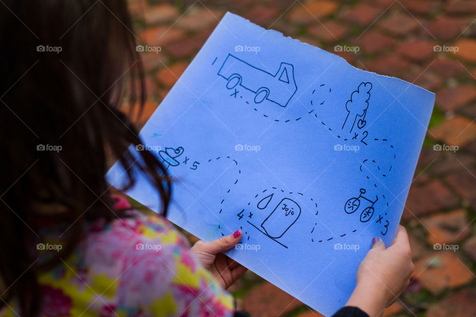 orange and blue - image of treasure hunt map and girl with blue and orange colors