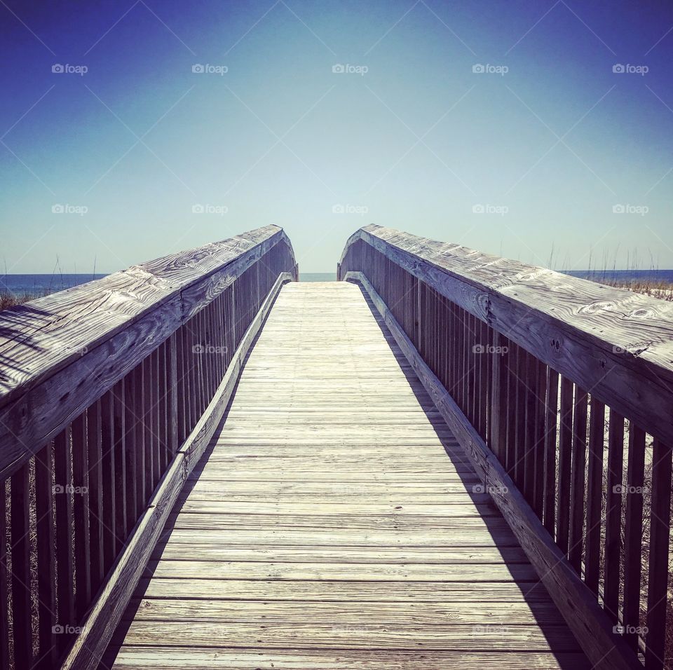 Wooden Board walk to the ocean.