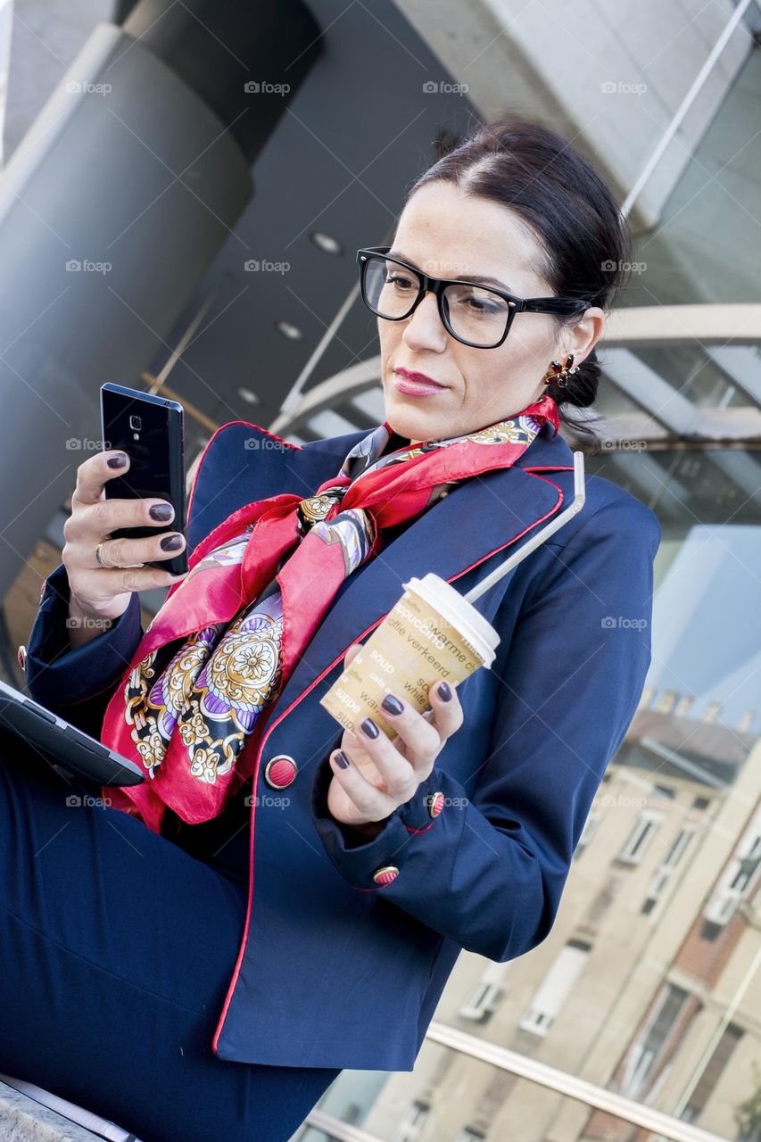 modern business woman on a coffee break