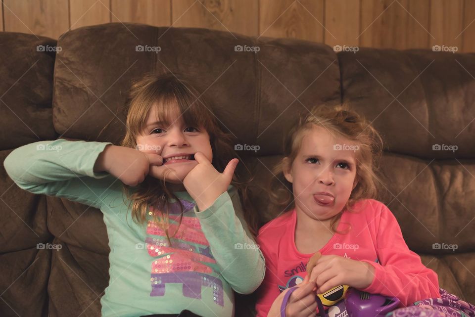 Silly little girls making faces