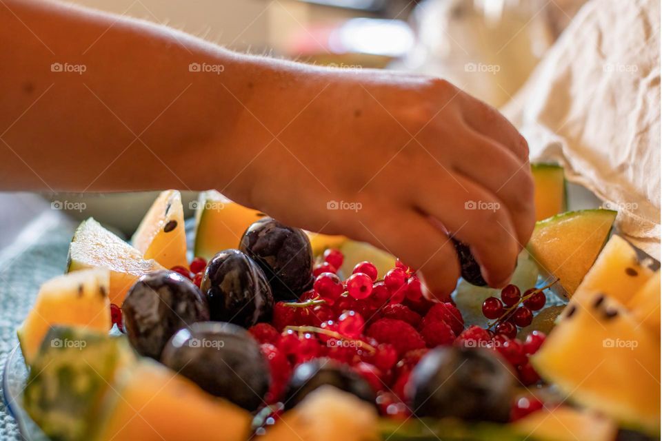 Making fruit salad, summer fruit