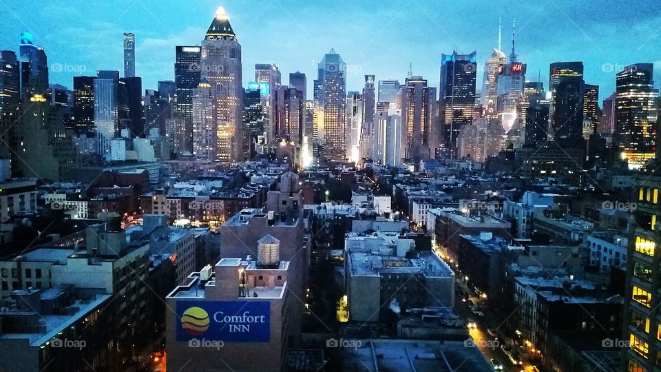 New York cityscape at night. Taken from top roof bar 'The Press Lounge'