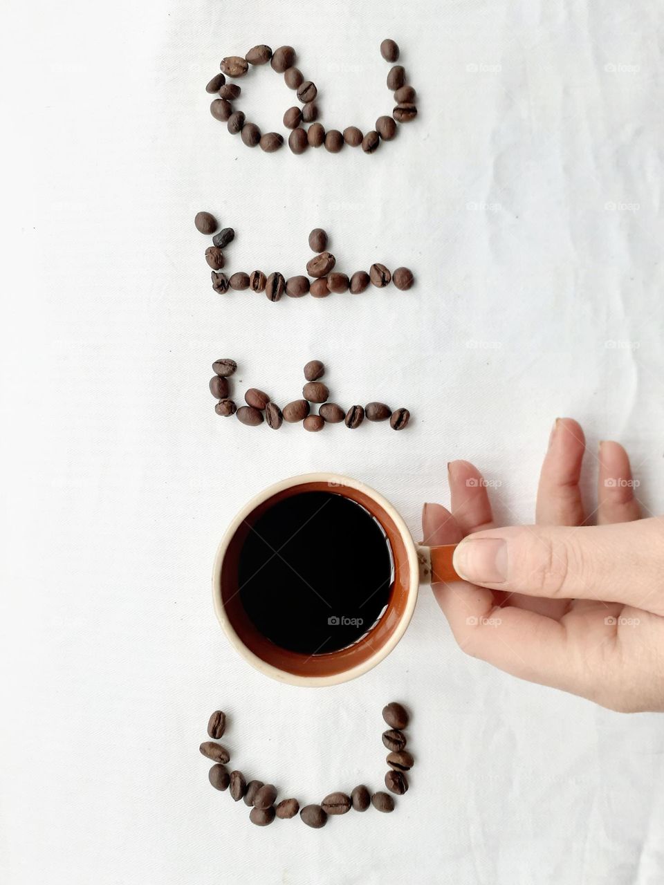 Inscription made of coffee freshly beans