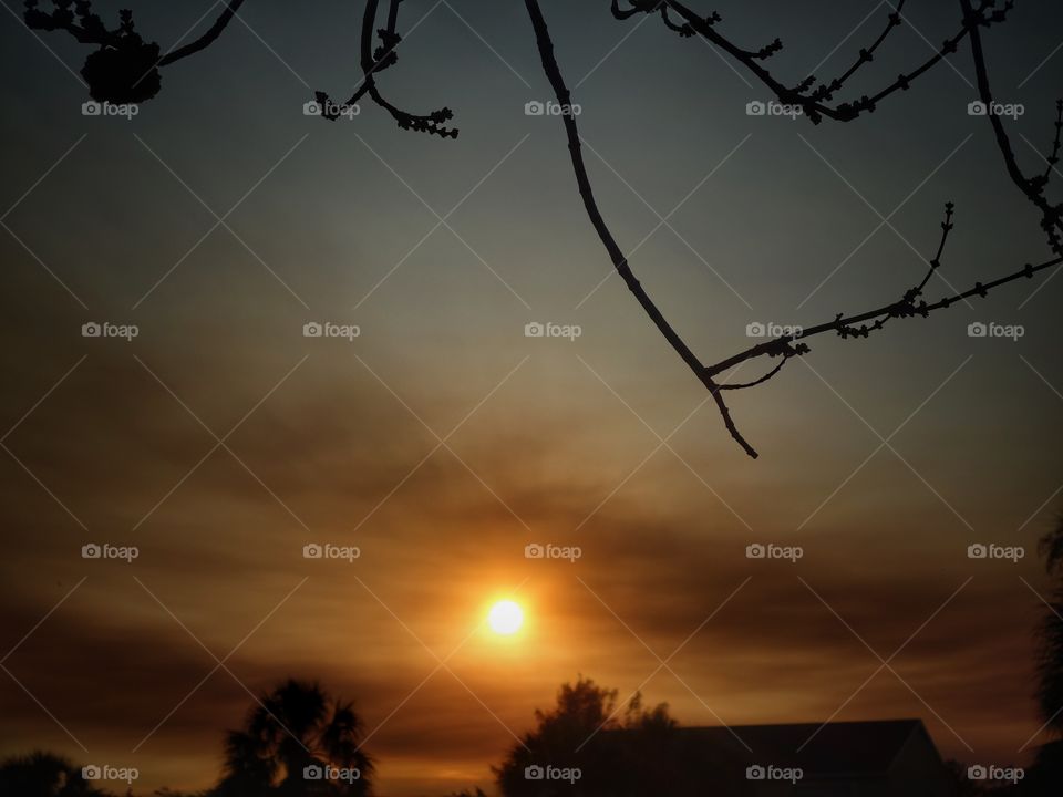 Sunset Beyond The House Silhouettes 