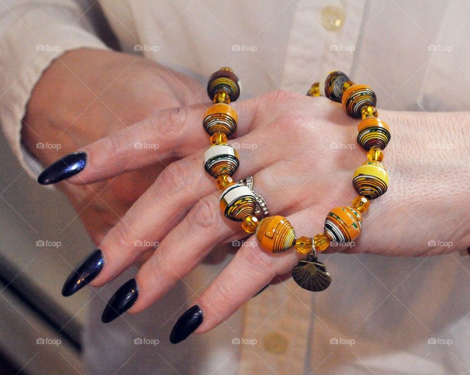 Hands and Bead Necklace 