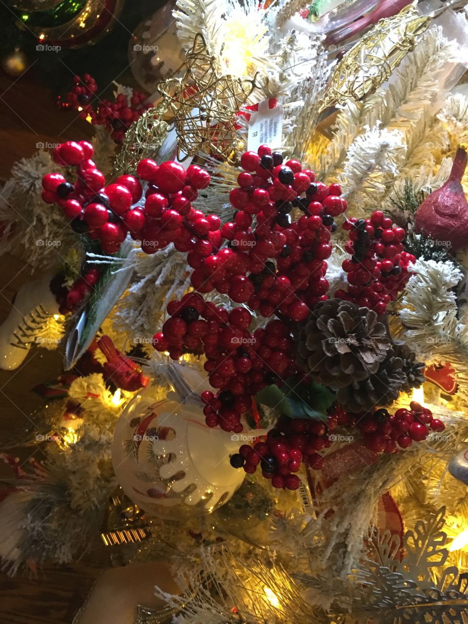 Red holly berries and gold tinsel 