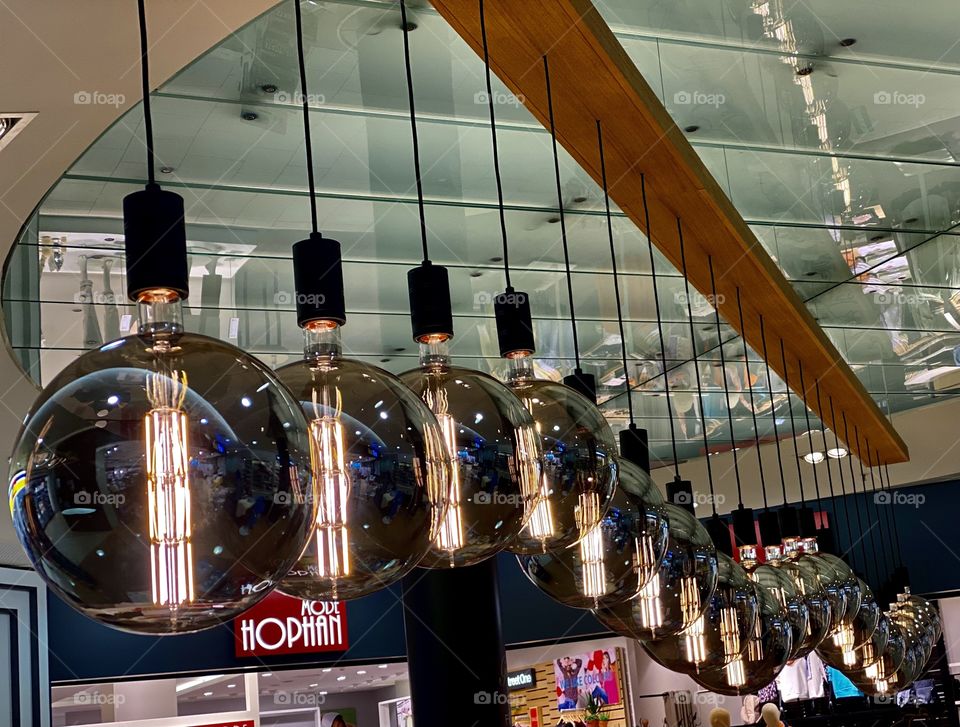 hanging mirror lamps in a row