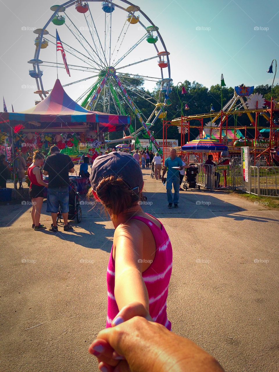 Follow me to the Ferris Wheel. Walking the midway at the county fair - follow me mission