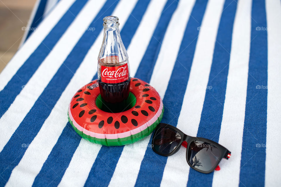 Summer set with Coca-Cola and sun glasses