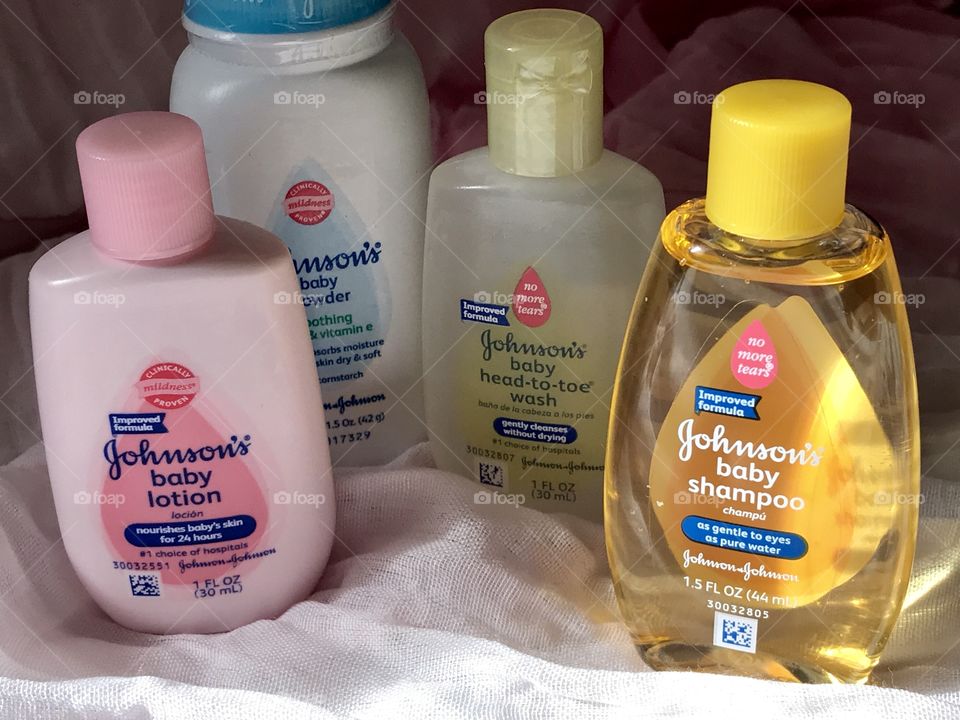 Johnson and Johnson baby products with a soft pink background