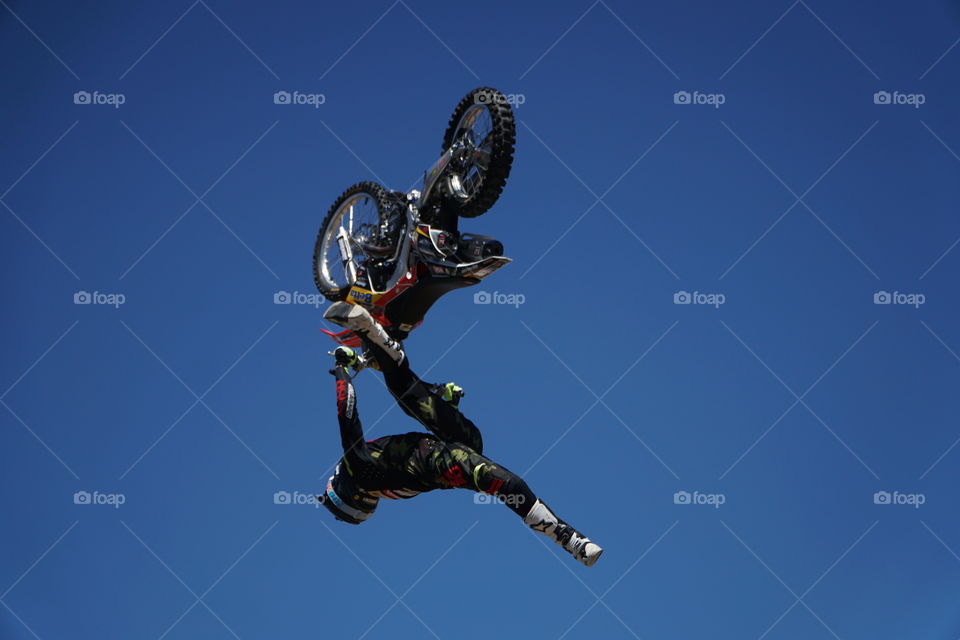 Stunt rider performing on a motorcycle