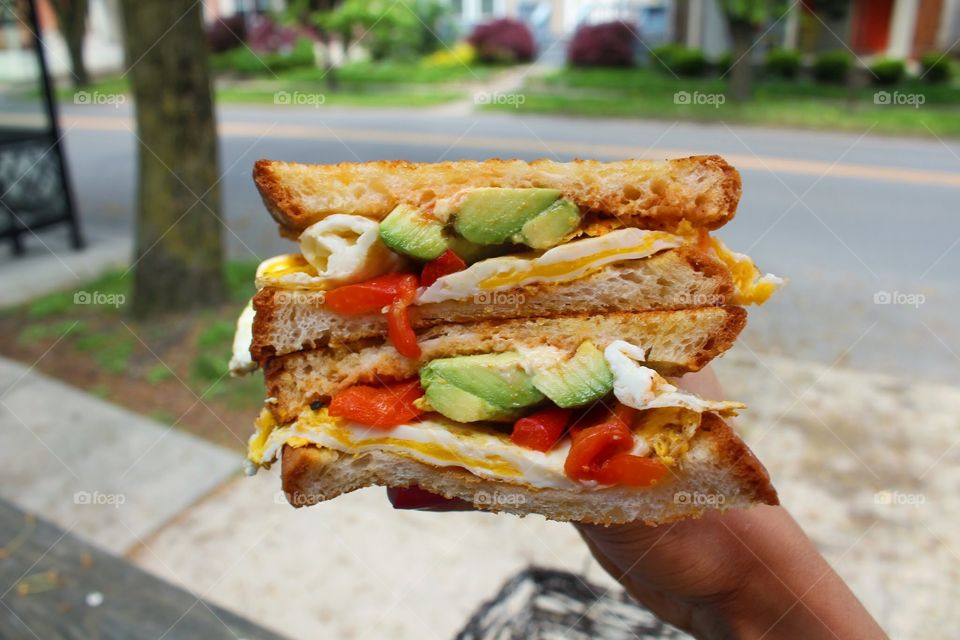 Sunrise breakfast sandwich. . Egg, avocado, roasted peppers. Katalinas, Columbus, OH.