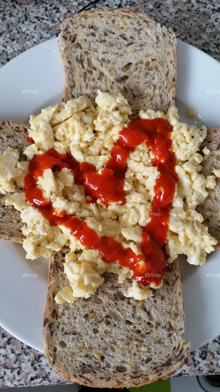 Breakfast. Scrambled egg on toast