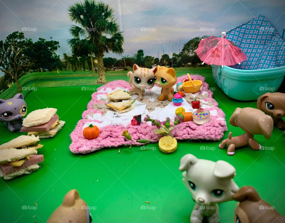 Characters LPS Toys For Kids Having A Picnic Scene With Our Exclusive Personal Photo Background From The Park In A Tropical Environment Looking At An Actual Real Mini Sandwich.