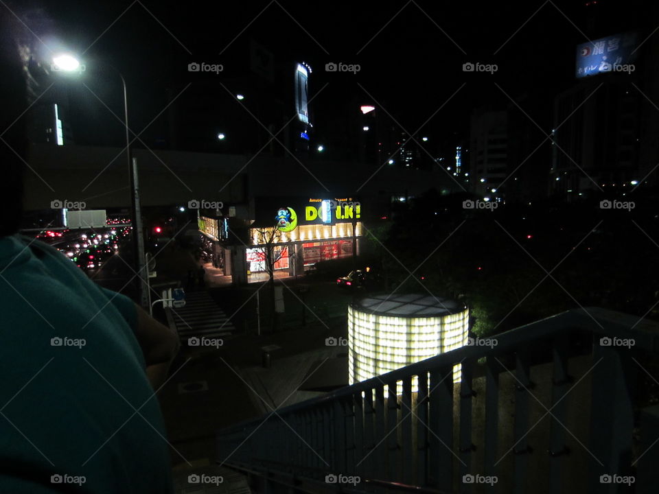 Night View from Top of Bridge, Tokyo Japan.  Don Quijote "Donki" Department Store Sign