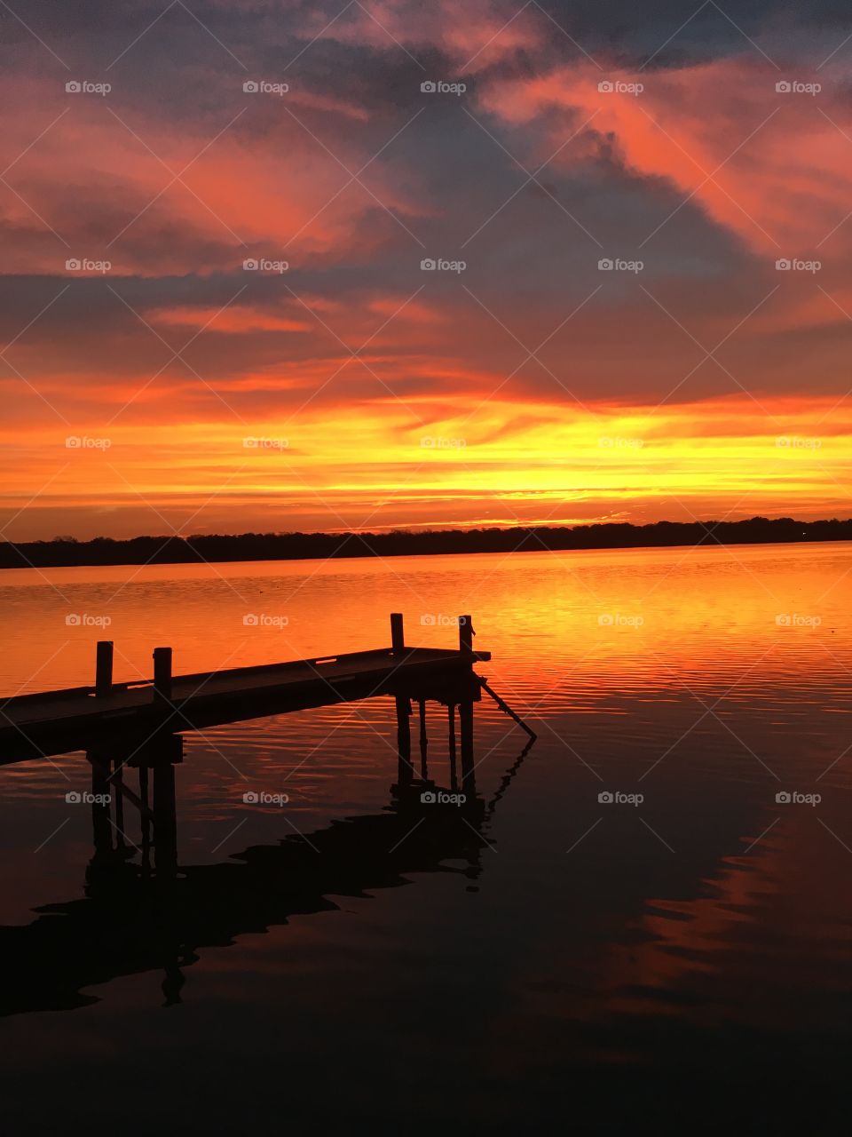 Reflection of sunset over lake