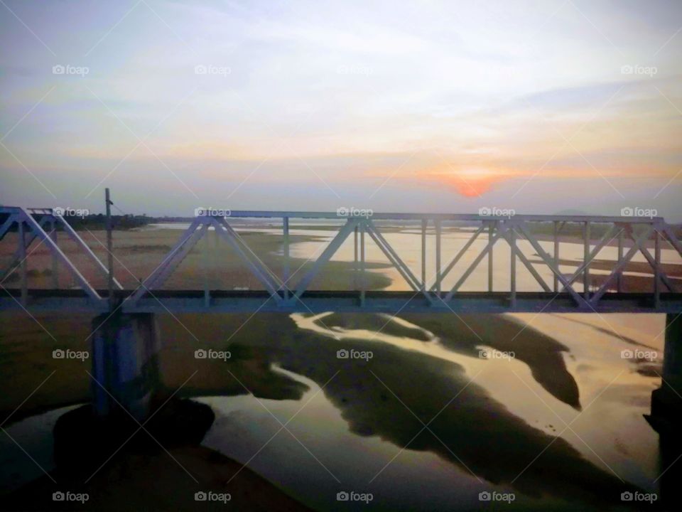 Sunset in railway Bridge