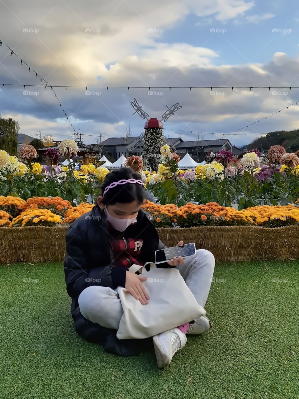 sitting on the grass and feeling its smoothness. inhaling every scents of every flowers while the cold wind touch my  skin.