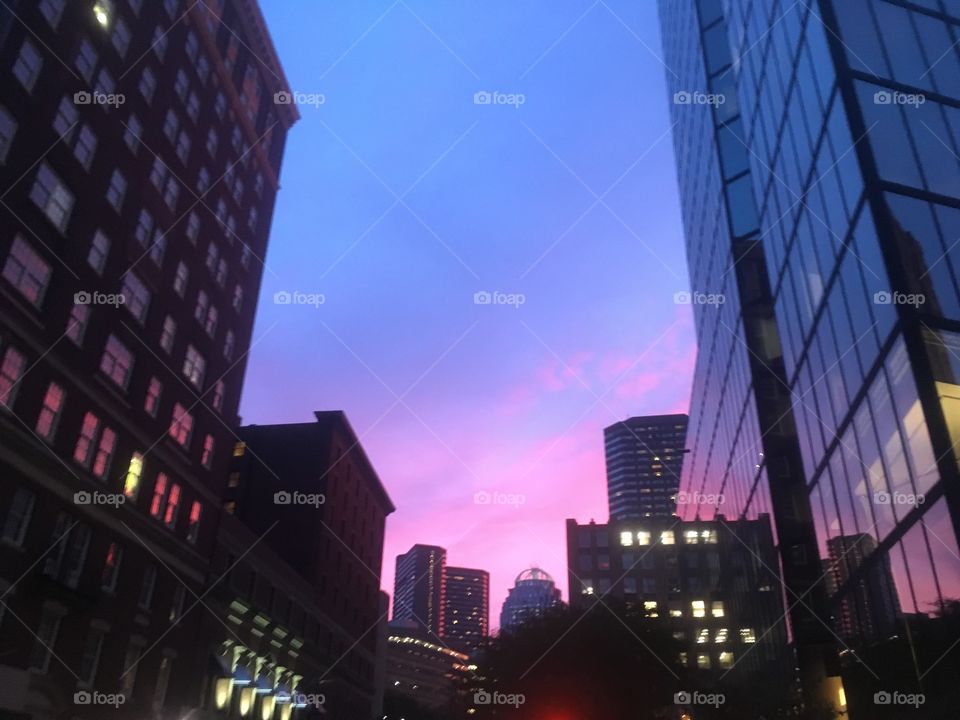 View of Boston Massachusetts at sunset with a pink color 