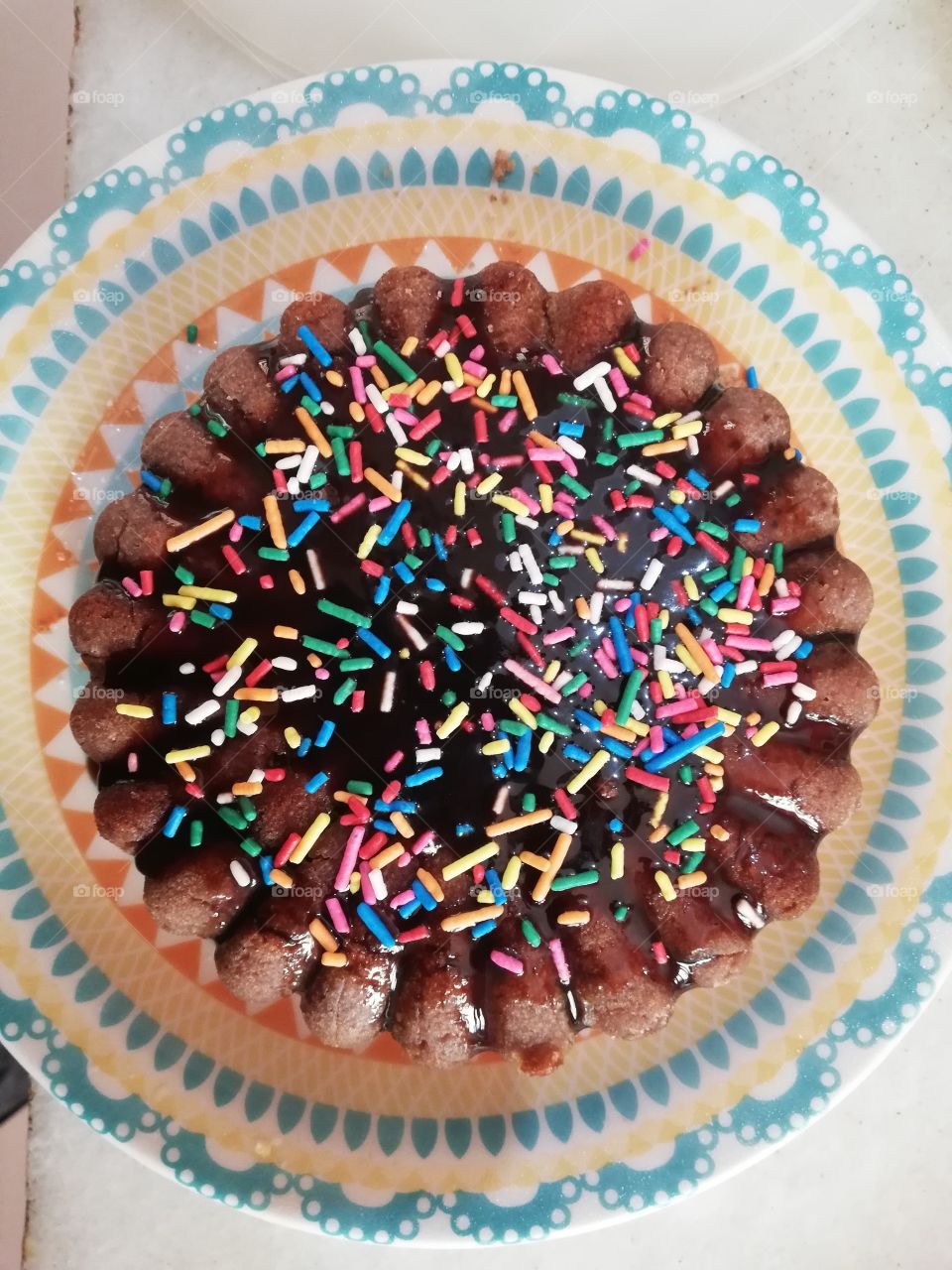 Chocolate cake with coloured sugar . Brazil 