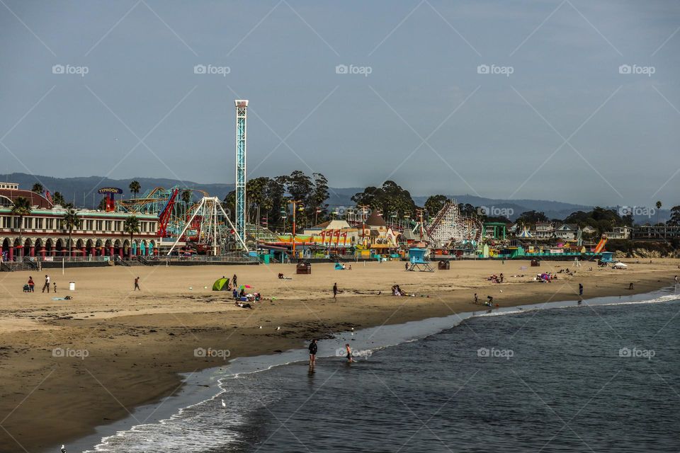 Santa Cruz Beach and Boardwalk on a beautiful day to enjoy the sun, sand, beach, surf, and rides 