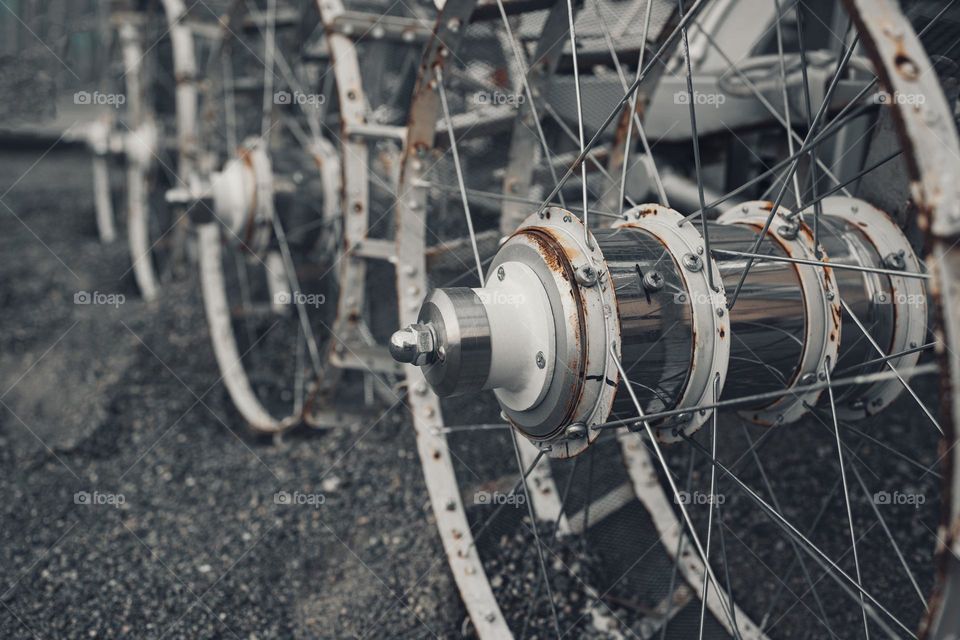 Retro metal wheel covered with rust