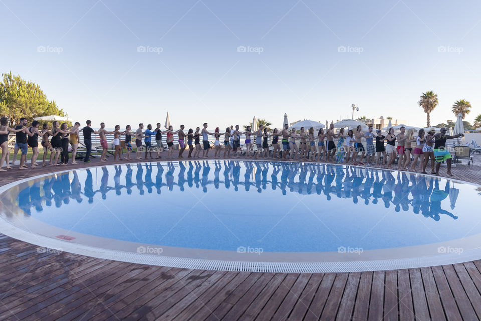 Having fun beside the pool