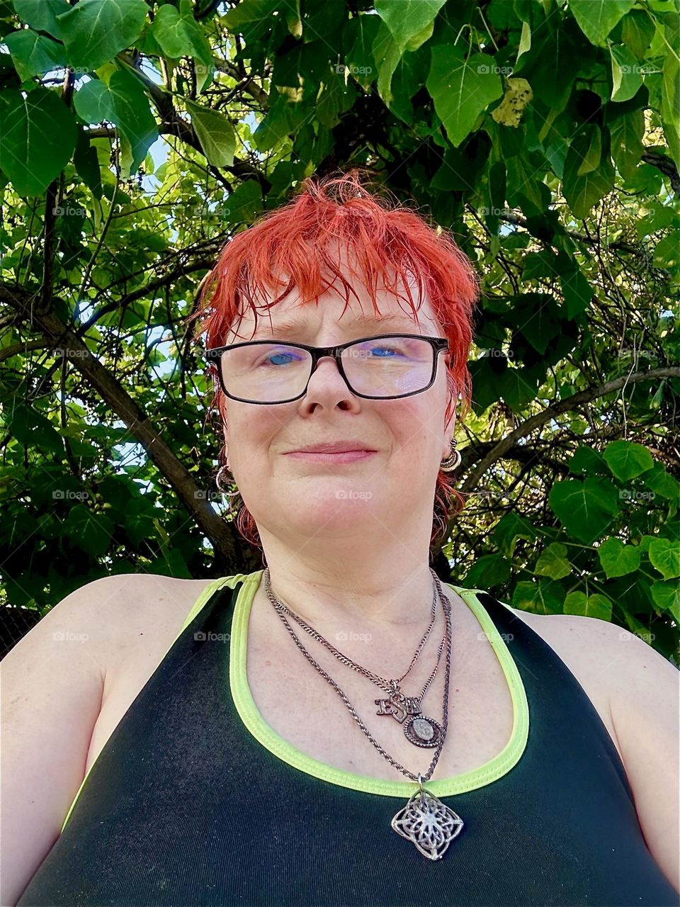 I, “Petra Schiller” a.k.a. “Maxine Firefox” am enjoying a cool breeze standing outside on the front deck of “Salvation”, the “28 ft 1969 Luhrs” cabin cruiser at “Newtown Creek” in LIC, home to myself and “Timothy Trespas”. 2024. Hypnotic Productions