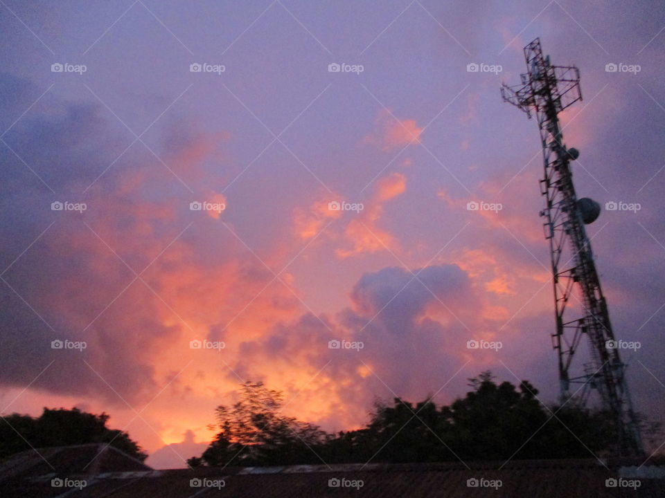 burning clouds on tower