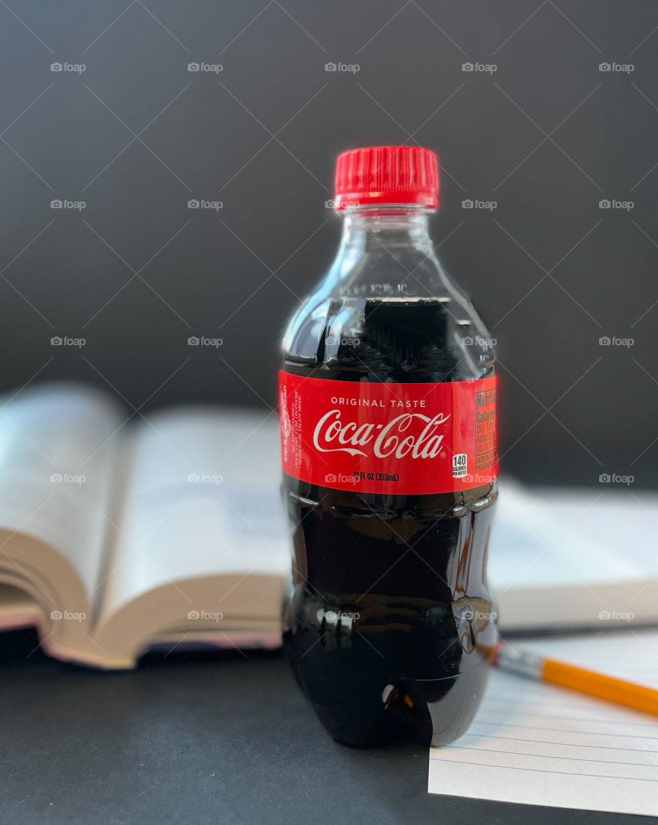 Coca Cola gives you a chance to refresh from studying for exams at school. Stop and energize with a drink. 