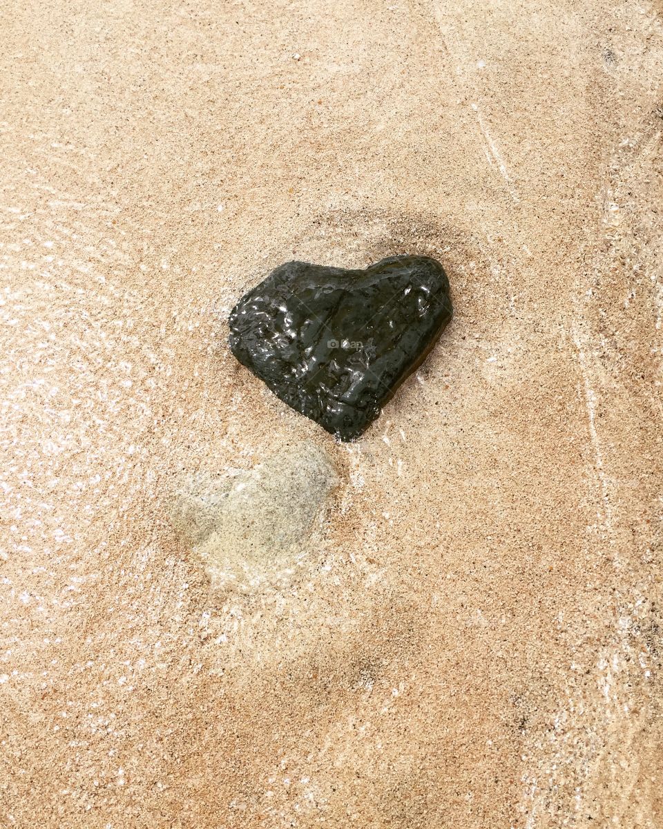 Heart Of Stone In The Sand Of A Beach In St. Martin