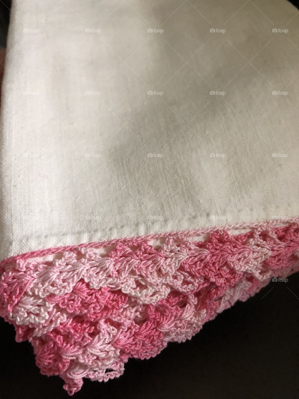 Crocheted pink linen edge