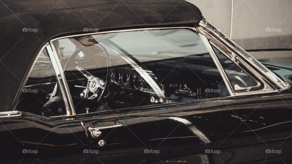 Mustangs interior through the window.