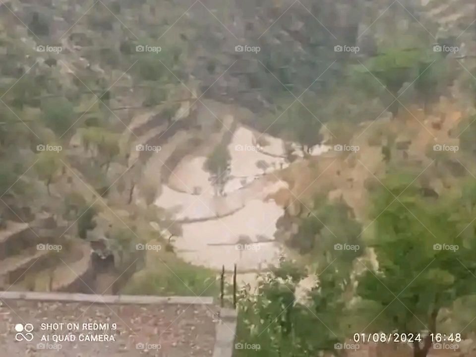 Glory be to God, the magnificent and picturesque view and the natural green trees are a view that is nothing more wonderful than it