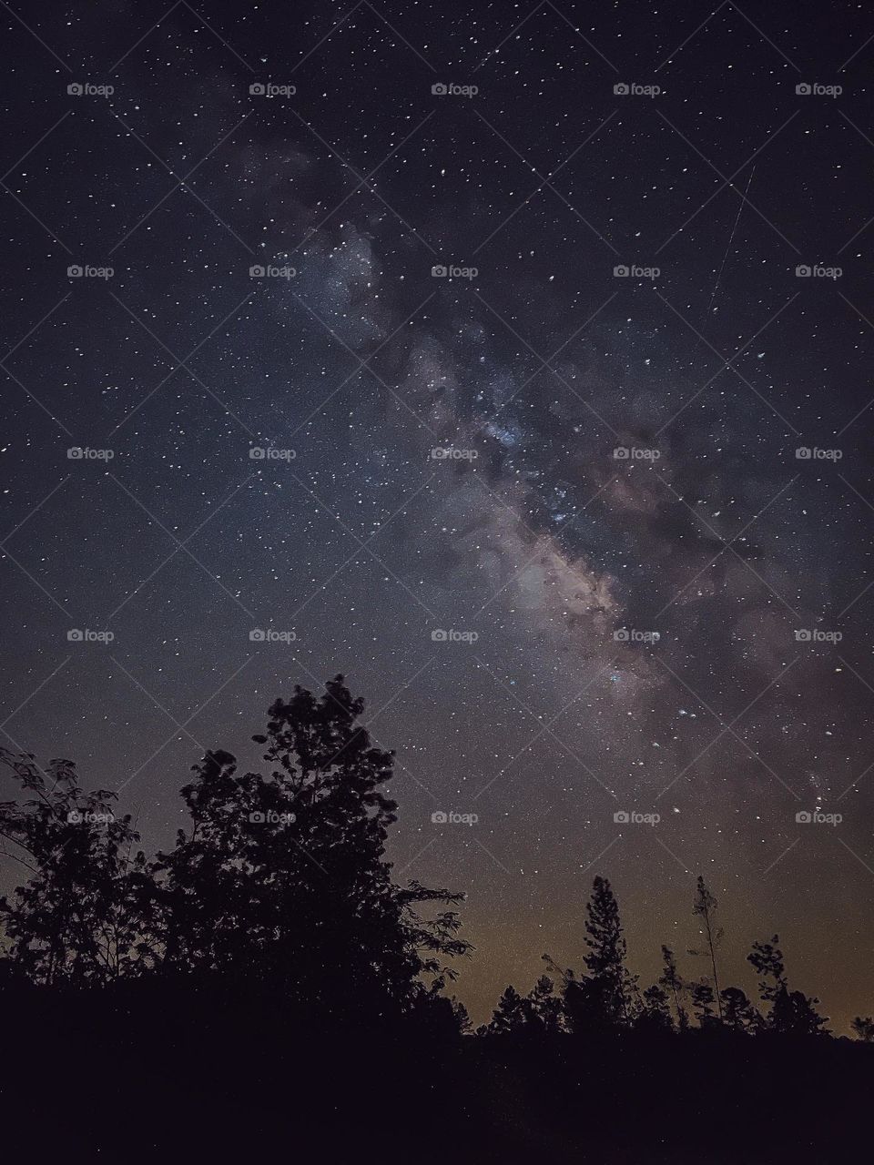 The Milky Way as it rises on August 4, 2023 racing the moon from the horizon.