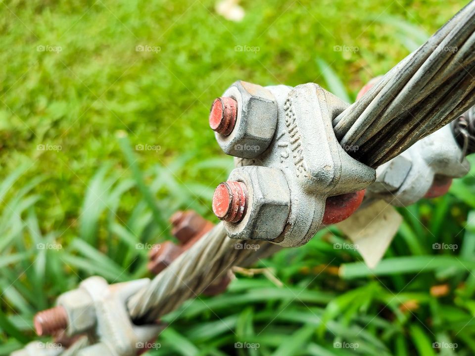 A pair of steel wire reinforcement bolts