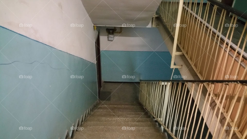 Stairs inside apartment building.