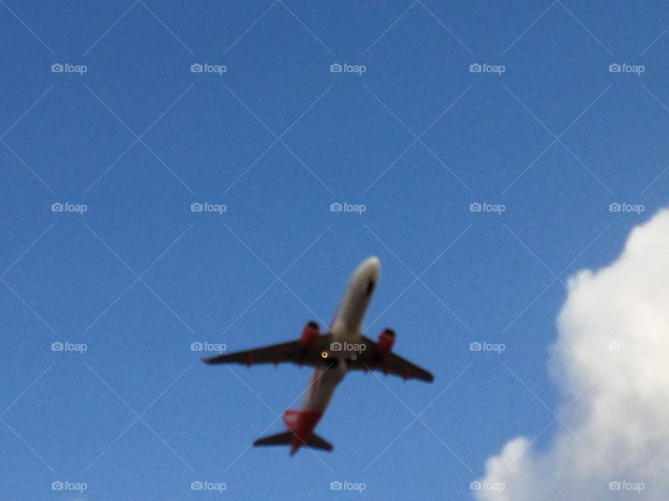 Beautiful airplane flying cross the sky.